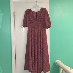 Long flowy red dress with zipper on the back